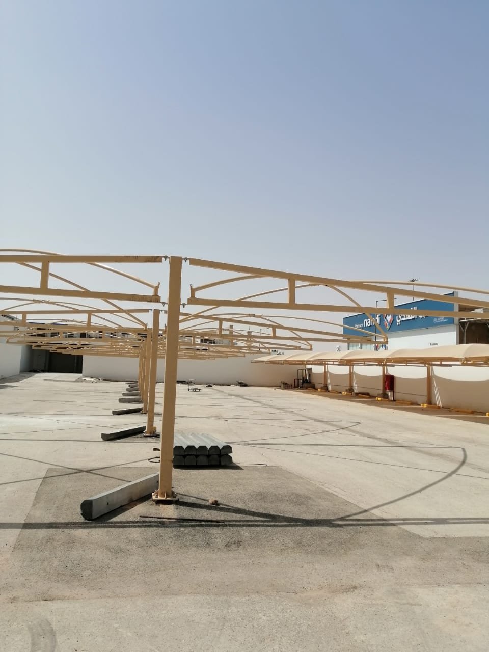 شركة بن غازي لتركيب المظلات والسواتر بالرياض تركيب وحدادة جميع انواع المظلات مظلات سيارات مظلات جلسات خارجية مظلات حدائق مظلات شينكو تركيب ساندوتش بانل مظلات متحركة مظلات خارجية بجودة عالية 